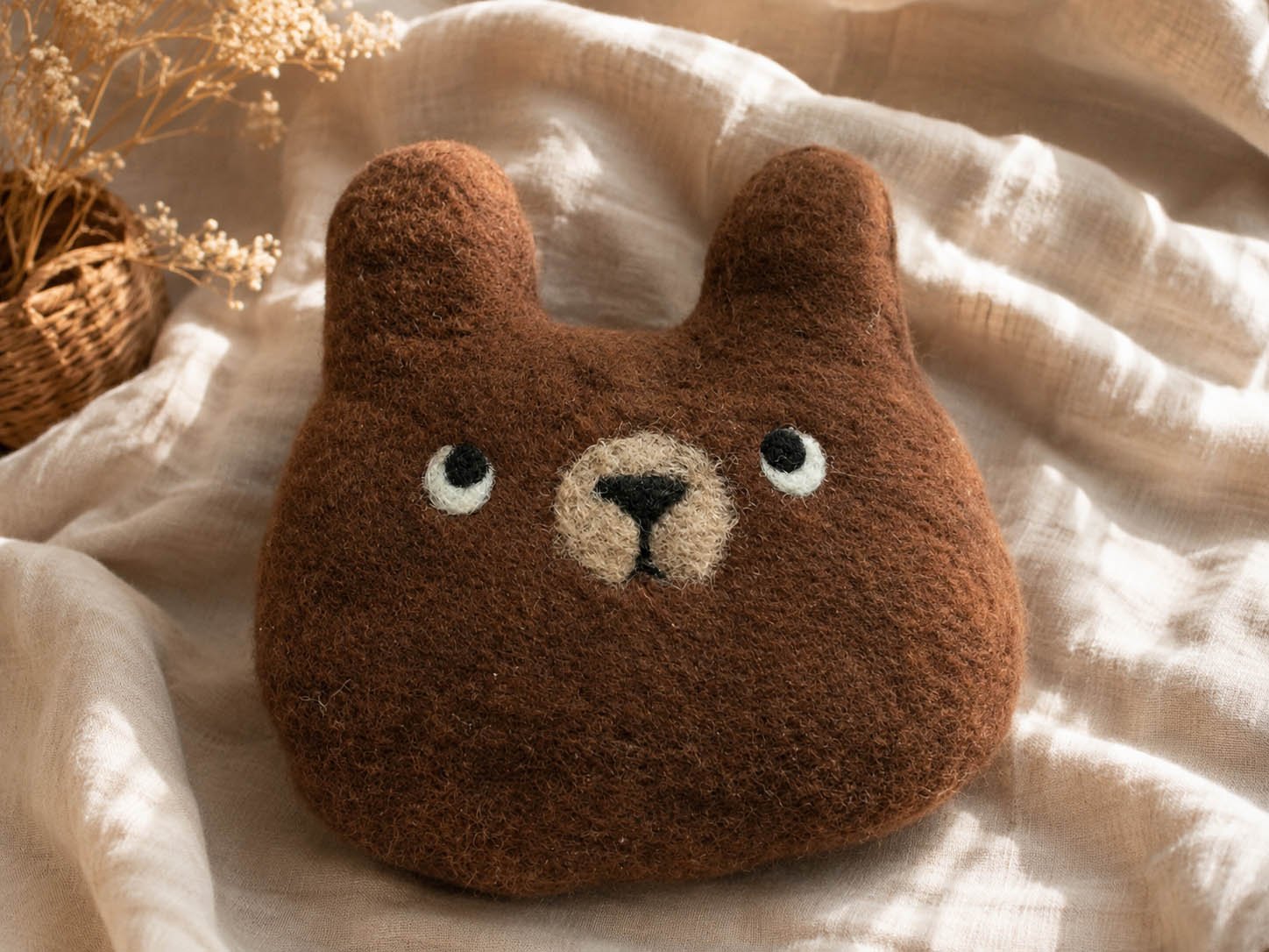 Felted bear cushion